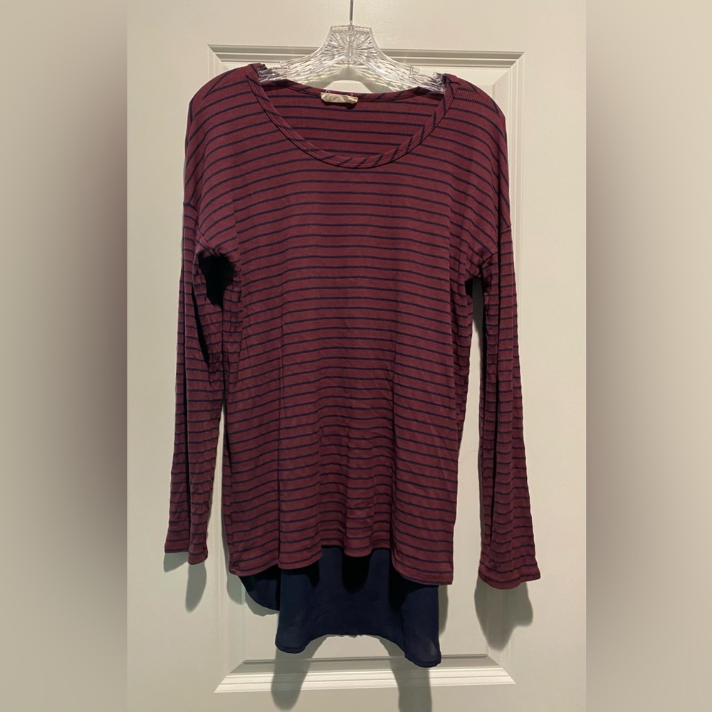 Women’s long sleeve burgundy and navy striped top. Size M. Sheer fabric in back.
